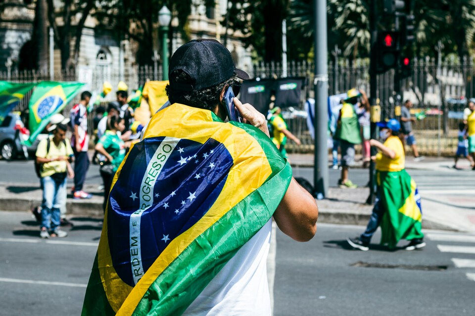 Brazil national team supporters wearing yellow "Seleção" shirts in the crowd at World Cup 2026.